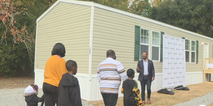 Local employer gifts local family new home after house fire