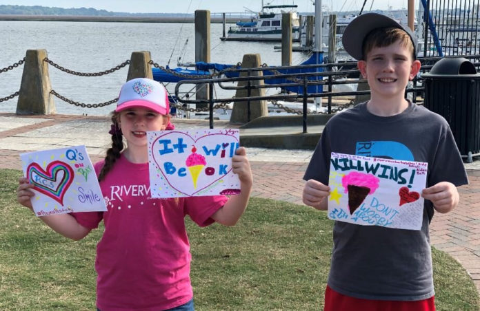 Elementary school students share positivity with Beaufort merchants