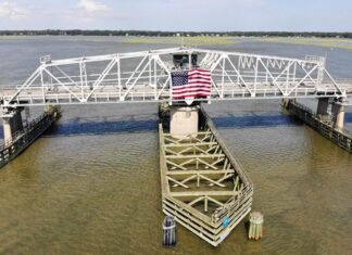 Beaufortβs Woods Memorial Bridge hosts flag for 4th of July holiday Beaufortβs Woods Memorial Bridge hosts flag for 4th of July holiday