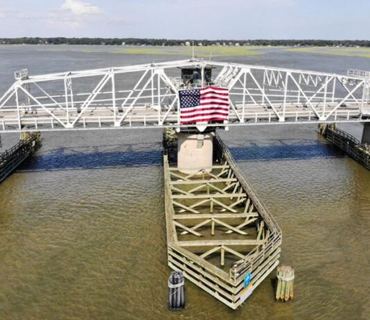 Beaufortβs Woods Memorial Bridge hosts flag for 4th of July holiday Beaufortβs Woods Memorial Bridge hosts flag for 4th of July holiday